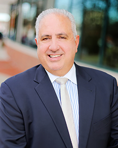 Mitchell Amado, interim CFO for AMHS