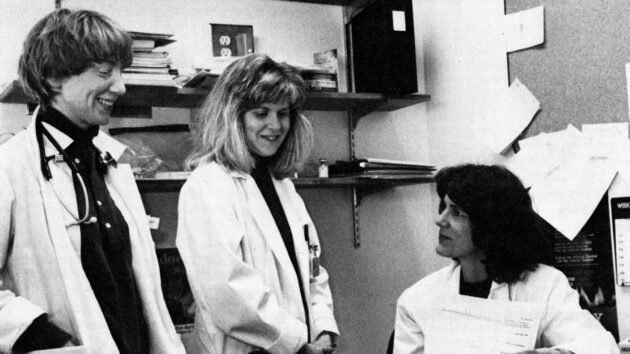 Albany Medical Center reflected on the AIDS epidemic, 40 years after AIDS/HIV was first identified in the United States. The photo shows Physician Assistant Robin Weiss, Clinical Nurse Specialist Beth Andrews, and Dr. Victoria Sharp in the AIDS Treatment Center. (From Center News, 1988)