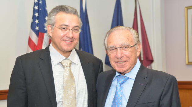 Alan Boulos, MD and his father Magdy Boulos, MD, in the Hyuck Auditorium at Albany Med in 2015