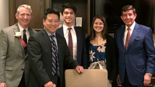 From Left, Albany Med President Dr. Dennis P. McKenna, '92, Dr. Jerome Chao and his children, Matthew and Madeleine, and Albany Med President Emeritus James J. Barba