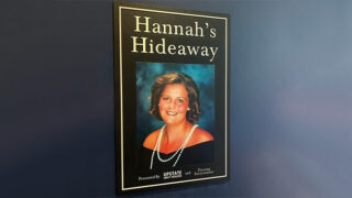 Plaque outside of Hannah's Hideaway, a small kitchen built at the Melodies Center for Childhood Cancer and Blood Disorders at Albany Medical Center, featuring a photo of Hannah Priamo, a former patient