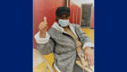 Jean Dobbs, 77, of Albany, giving a thumbs up after getting her Covid vaccine
