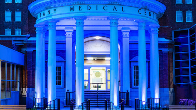 Albany Medical Center Pillars lighted blue
