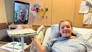 Sarah Maldonado Hurd and her husband Bill, deployed in Africa but connected via iPad in a virtual visit
