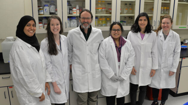 Ken Norman, PhD, and his lab team posing for a photo