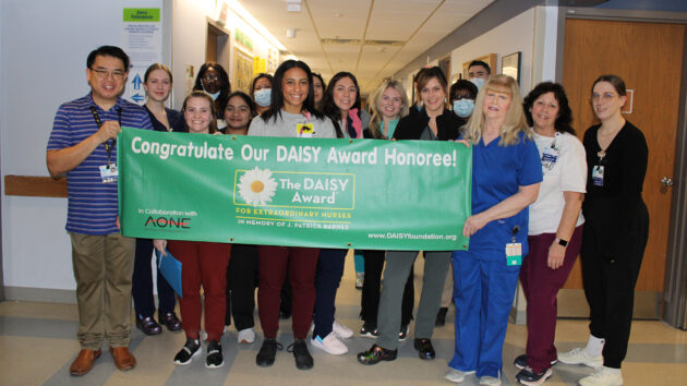 Alexis Perryman, RN, from MICU receives the DAISY Award