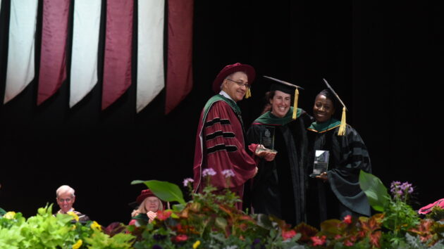 Group pictured on stage at the 2024 Albany Medical College Commencement ceremony