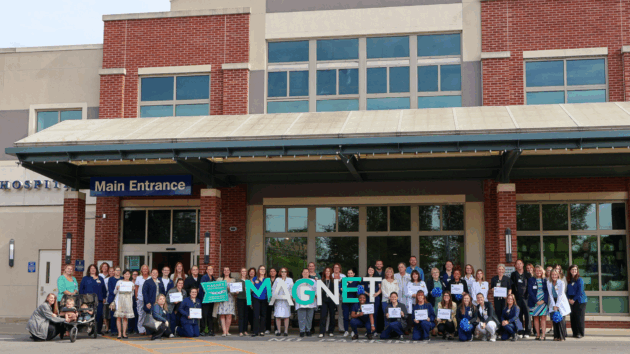 Group photo of Magnet Recognized nurses gathered in front of Saratoga Hospital