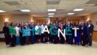 Nurses and other hospital leaders celebrating Magnet surveying