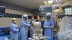 Orthopedic Surgery team in an operating room with the MAKO surgical robot