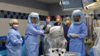 Orthopedic Surgery team in an operating room with the MAKO surgical robot