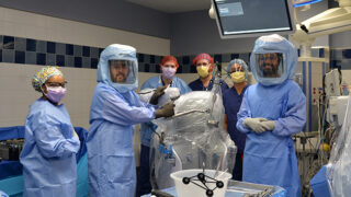 Orthopedic Surgery team in an operating room with the MAKO surgical robot