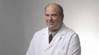 headshot photo of dr richard uhl