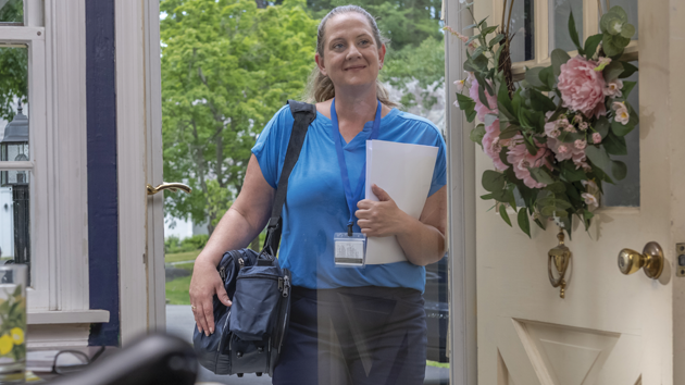 home health nurse visiting a home