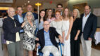 Group photo of participants attending the Columbia Memorial Health ribbon cutting celebration of the newly renovated Susan Evans Koskey Family Room.